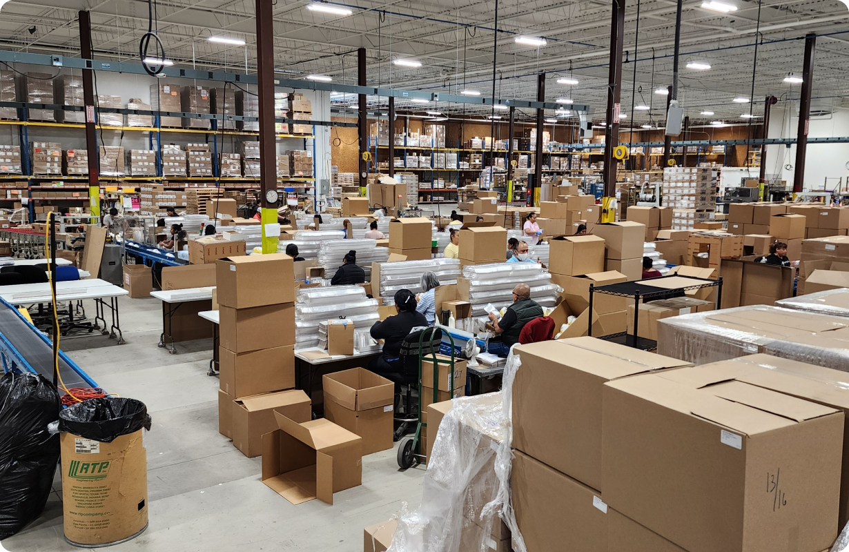 The inside of a warehouse with boxes stacked